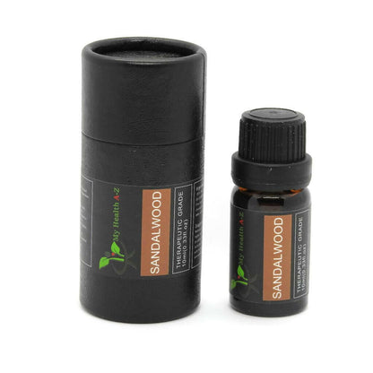 black cylinder and next to it a 10ml sandalwood essential oil bottle