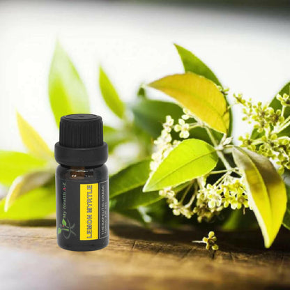 myrtle fowers and leafs behind a bottle of lemon myrtle essential oil